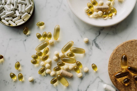 Various supplements laid out on a table-top
